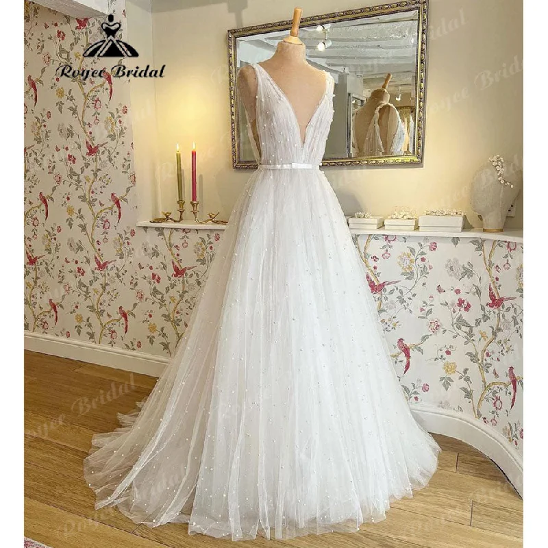Knit DressRoycebridal Modest Pearls Summer Beach Deep V Neck Wedding Dress 2025 Boho A Line Bridal Gowns Open Back Custom Made vestidos Knit DressRoycebridal Modest Pearls Summer Beach Deep V Neck Wedding Dress 2025 Boho A Line Bridal Gowns Open Back Custom Made vestidos