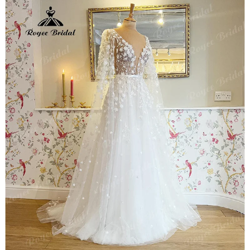 Sequined DressRoycebridal Deep V Neck Lace Floral Beach Fairy Wedding Dresses with Cape 2025 Backless Wedding Gowns vestido de noiva princesa Sequined DressRoycebridal Deep V Neck Lace Floral Beach Fairy Wedding Dresses with Cape 2025 Backless Wedding Gowns vestido de noiva princesa