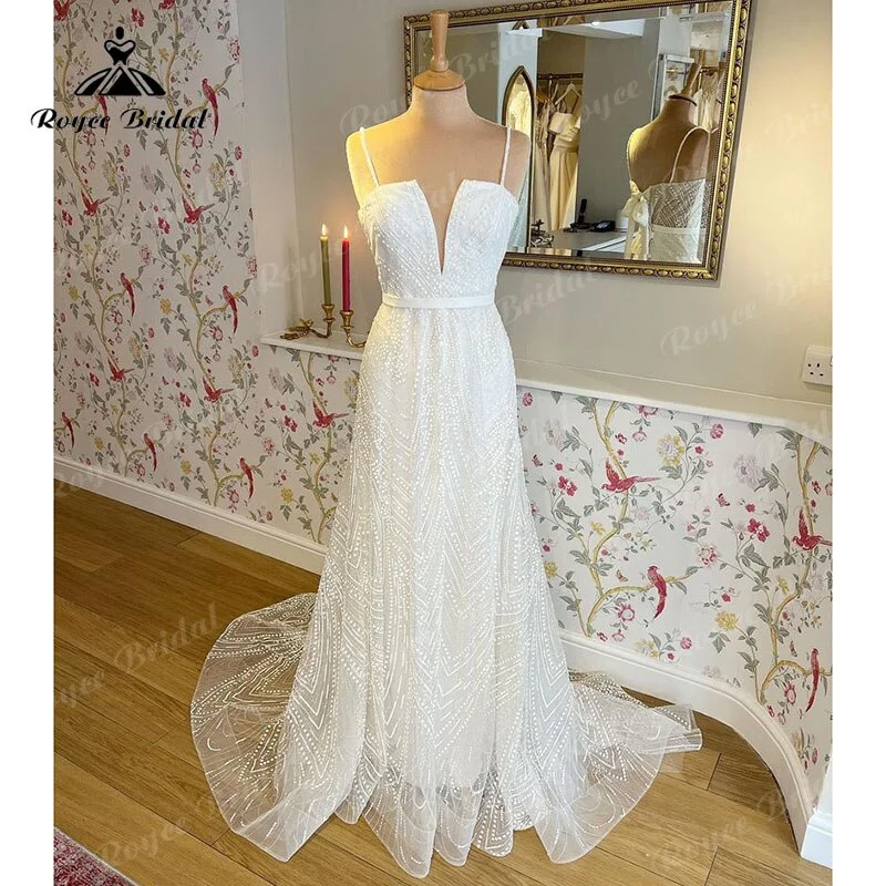 Plunging Neckline DressBoho A-Line Wedding Dress Custom For Women 2025 Bride Gown Sexy V-neck Spaghetti Straps Back Lace Up Bow Belt Lace Sweep vestido Plunging Neckline DressBoho A-Line Wedding Dress Custom For Women 2025 Bride Gown Sexy V-neck Spaghetti Straps Back Lace Up Bow Belt Lace Sweep vestido