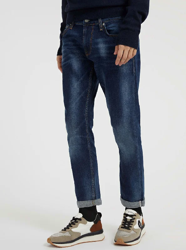 Modern Ripped and Distressed Men's JeansEco Low Rise Slim Tapered Denim Jeans In Meadow Selvedge Wash Modern Ripped and Distressed Men's JeansEco Low Rise Slim Tapered Denim Jeans In Meadow Selvedge Wash