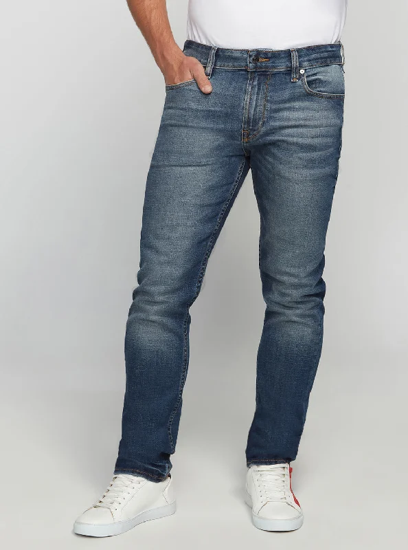 Latest Designer Men's JeansEco Low-Rise Slim Tapered Denim Jeans In Stratus Blue Wash Latest Designer Men's JeansEco Low-Rise Slim Tapered Denim Jeans In Stratus Blue Wash